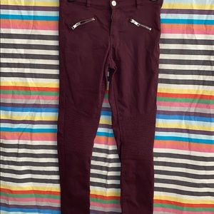 Burgundy jeans with ribbed knee pattern